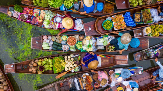 热带叻丕府泰国著名的漂浮市场DamonoenSaduak浮动市场农民去销售有机产品水果蔬菜和泰国食乘船旅游者泰国拉查布里Ratc图片