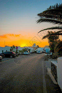 岛夏天OiaSantorini希腊以浪漫和美丽的日落闻名传统图片
