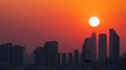 环境亚洲人日落时曼谷天线的空中景象阳光照耀在泰国商业区后下落广告图片