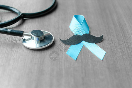 对前列腺癌症的认识带听诊器的浅蓝丝带以支持人们生活和患病者男子保健护理和世界癌症日概念增生慈善机构药物图片