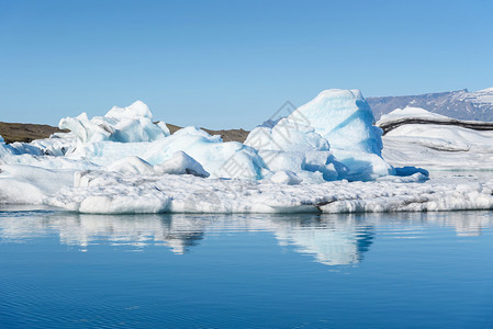 旅游冰岛Jokulsarlon冰川环礁湖山的美景全球变暖概念选择重点蓝色的漂浮图片