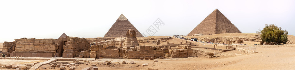 雕塑埃及吉萨的狮身人面像和金字塔全景埃及吉萨的狮身人面像和金字塔全景文化结石图片