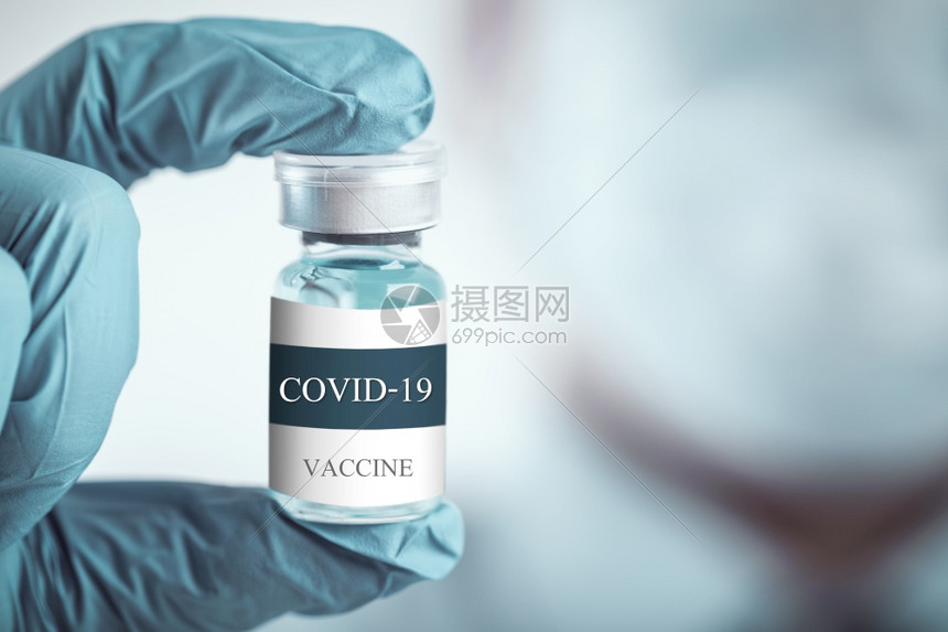 蓝色的药店小瓶治疗冠状感染的蓝疫苗罐瓶建立对Covid19保健与医疗概念的免疫力以及图片
