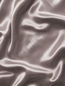 光滑的或者复古在SepiatonedRetro风格中平滑优雅的棕色丝绸或可以用作背景图片