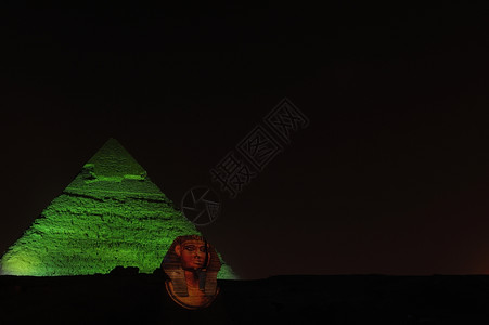 过去的非洲在埃及开罗所有吉萨金字塔前一排骆驼运送旅游者古老的图片