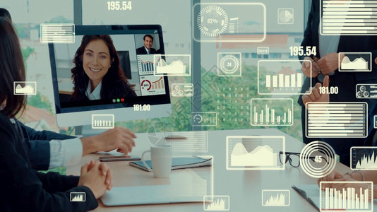 企业员工视频电话会议中商务人士的创意视觉营销数据分析和投资决策制定的数字技术概念企业员工视频电话会议中商务人士的创意视觉计算商业图片