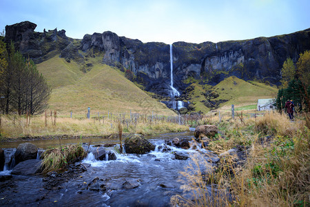 长距离水瀑照片欧洲冰岛西弗湾小瀑布的观察欧洲管子地质学绿色图片