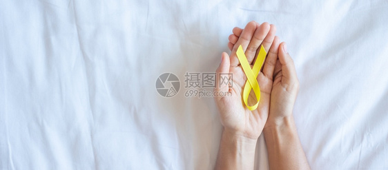 徽九月预防Sarcoma骨头膀胱儿童癌症意识月黄丝带以支持人们生活和患病儿童保健世界癌症日概念保健及世界癌症日概念健康图片