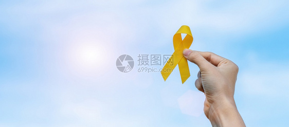 九月象征幸存者预防Sarcoma骨头膀胱儿童癌症意识月黄丝带以支持人们生活和患病儿童保健世界癌症日概念保健及世界癌症日概念图片