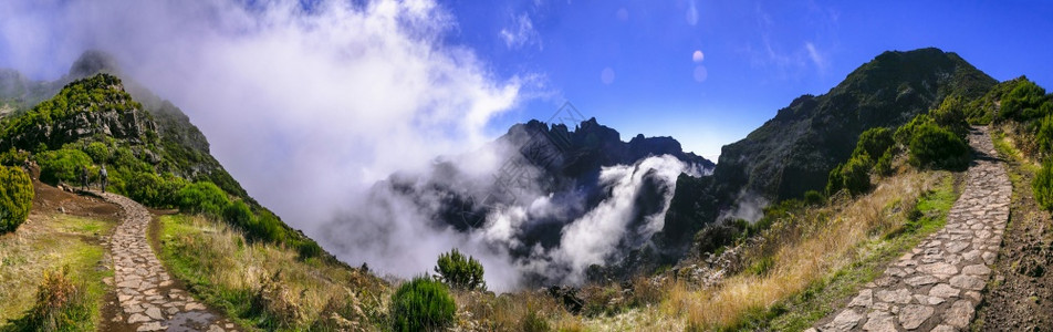 马德拉岛岩石山脉的登活动为皮科鲁伊沃飞过云中的最高点多岩石远足最佳图片