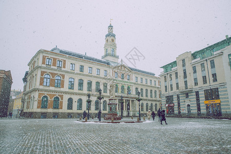 公园拉脱维亚语春天托市里加旧城中心雪暴云人和建筑师图片