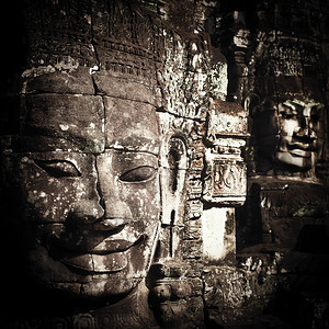 岩石宗教汤姆柬埔寨暹粒省吴哥Wat综合体Bayon寺庙的佛像雕刻巨大图片