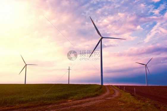 资源日落时风农业用地和天空上的风力机场绿色可再生替代能源态的保护图片