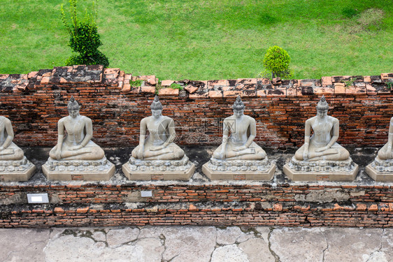 考古学大城府目的地泰国Ayutthaya旅游景点知名的WatYaiChaimongkol佛像图片