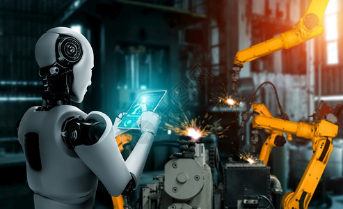 工程师用于厂生产装配的机械化工业器人和械臂工业革命和自动化制造过程的人工智能概念用于工厂生产装配的机械化工业器人和械臂自动的软件图片