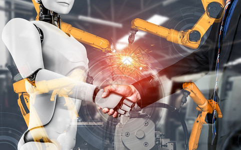 行业转型手臂机械化工业器人与类工在未来厂中协同作业革命和自动化制造过程的人工智能概念机械化工业器人和类工在未来厂中协同作图片