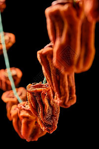 农场日本传统干燥的PersimmonDessurt日式大海龙头吊在绳子上闭紧有选择重心垂直框架一种痕迹图片