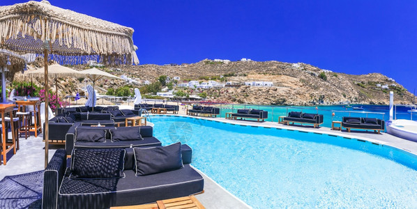 椅子酒店豪华希腊节日斯托宁米科诺岛著名的超级天堂海滩与游泳池宽敞的Tralsqua区自然图片