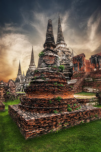 高棉Ayutthaya泰国旅游地貌和目的古老佛教寺庙废墟位于WatPhraSriSanphet寺庙日落天空下的Ayutthaya图片