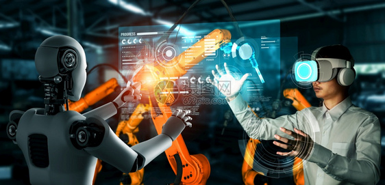 仓库行业控制机械化工器人与类工在未来厂中协同作业革命和自动化制造过程的人工智能概念机械化工业器人和类工在未来厂中协同作图片