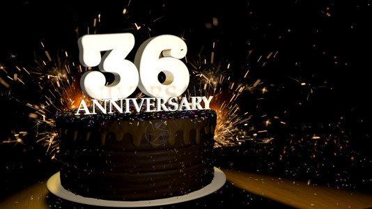 乐趣颜色周年纪念36卡圆形巧克力蛋糕装饰着蓝色红黄绿的糖衣杏仁木桌上有白色数字背景是人造火星和彩色糖衣落在桌子上3D插图周年纪念图片