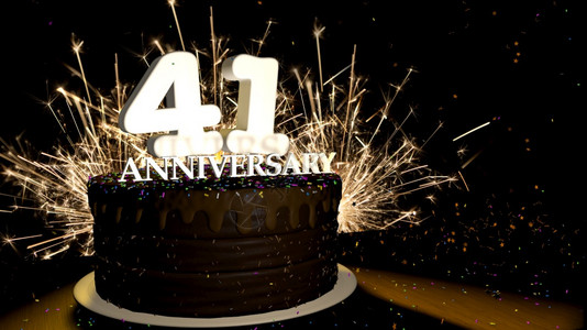 蓝色的魔法周年纪念41卡圆形巧克力蛋糕装饰着蓝色红黄绿的糖衣杏仁木桌上有白色数字背景是人造火星和彩色糖衣落在桌子上3D插图周年纪背景图片