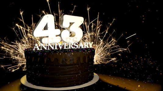 基多周年纪念43卡圆形巧克力蛋糕装饰着蓝色红黄绿的糖衣杏仁木桌上有白色数字背景是人造火星和彩色糖衣丸落在桌子上3D插图周年纪念贺图片