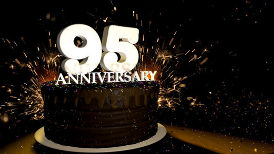 特别的周年纪念95卡圆形巧克力蛋糕装饰着蓝色红黄绿的糖衣杏仁木桌上有白色数字背景是人造火星和彩色糖衣落在桌子上3D插图周年纪念贺图片