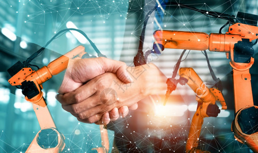 机械化工业器人手臂和商务握双曝光人工智能成功协议的概念用于未来工厂的业革命和自动化过程机械工业器人手臂和商务握双曝光团队图片