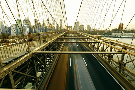 日落纽约市历史布鲁克林大桥是美国最古老的桥梁之一于1869年启动并于183年4后完工6207年月6年月图片