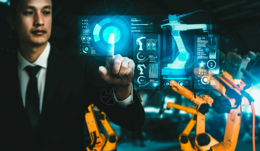 机械的维护建造用于数字工业和厂机器人技术的先进机械臂系统使用连接到互联网络的IOT软件由工业程控制的自动化造机器人用于数字工业和图片