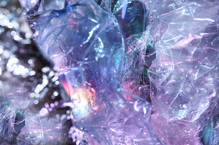 巴斯塔809年代风格的抽象时尚全息背景亮酸色皱褶玻璃纸薄膜的真实质感SynthwaveVaporwavewebpunk大众现实主图片