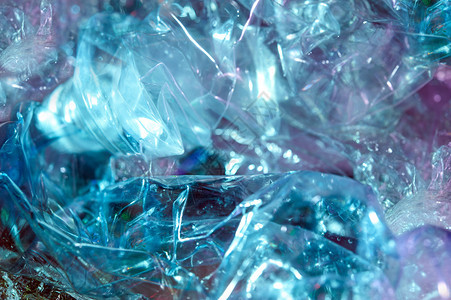 全息图809年代风格的抽象时尚全息背景亮酸色皱褶玻璃纸薄膜的真实质感SynthwaveVaporwavewebpunk大众现实主图片