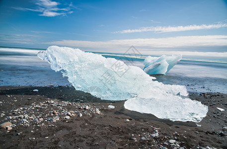 在冰岛JokulsarlonLagoon移动的冰bergs模糊的长距离接触透视云极端约古沙龙图片