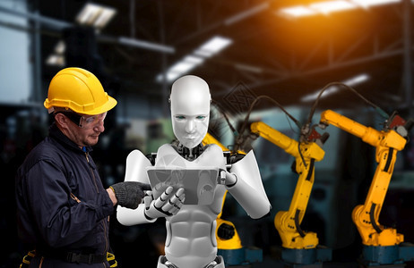 团队合作机械化工业器人与类工在未来厂中协同作业革命和自动化制造过程的人工智能概念机械化工业器人和类工在未来厂中协同作智力技术图片