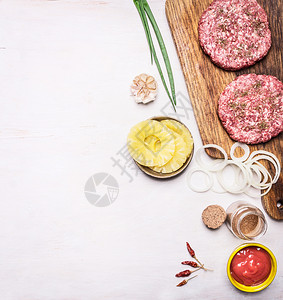 汉堡洋葱叶番茄酱洋葱环菠萝边框木制生锈背景顶视图的文本位置猪肉边界沙拉图片