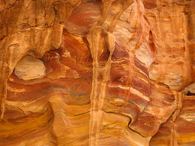 锡克地区约旦佩特拉不真实的岩层形成情况黄色侵蚀岩石红色图片