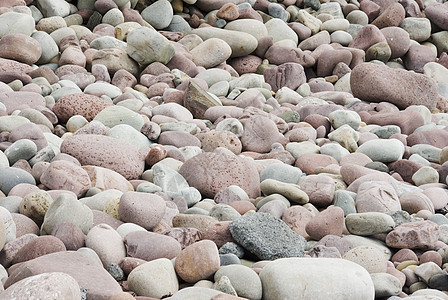 孔滩海滩阳光灰色沉积侵蚀石头白色岩石阳光照射花岗岩地面图片