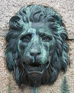 狮子面具风化花岗岩雕塑石头古铜色古董动物建筑学金属青铜图片