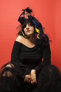 独一无二女人的肖像帽子照片女性俱乐部中年戏剧女士化妆品衣服图片