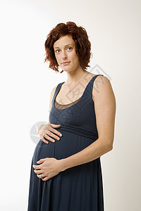 孕妇母性女性眼神培育怀孕父母观众照片关爱中年背景图片