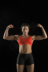 运动肌肉的女性运动员眼神健美照片运动服文胸女士双臂身体素质成人二头肌图片