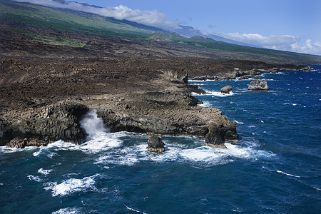 岩石海岸的波浪地貌海滩熔岩支撑旅行海洋海浪海岸线天线旅游图片