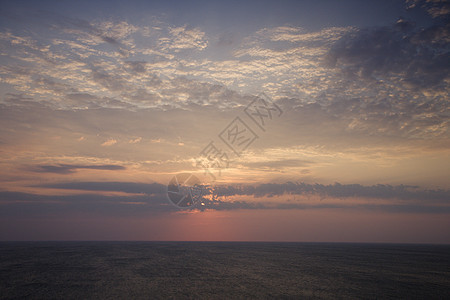 日出在海洋之上太阳海景海滩海岸照片天空日落风景水平地平线图片