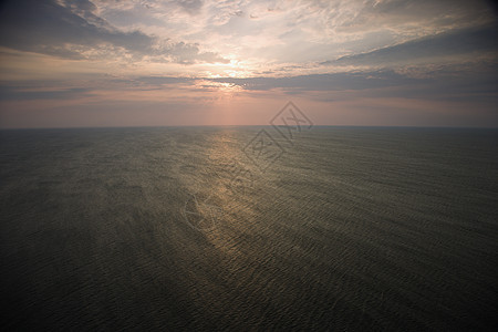 日出在海洋之上照片风景水平海景太阳地平线海滩天空海岸图片