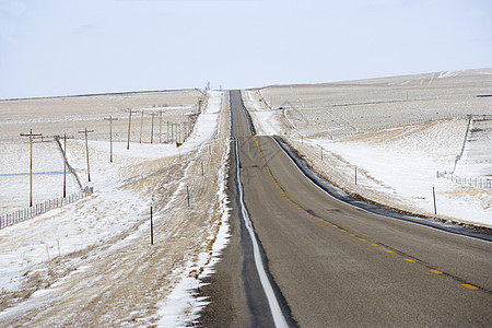 下雪的农村道路电力乡村旅游运输丘陵国家照片线路水平假期图片