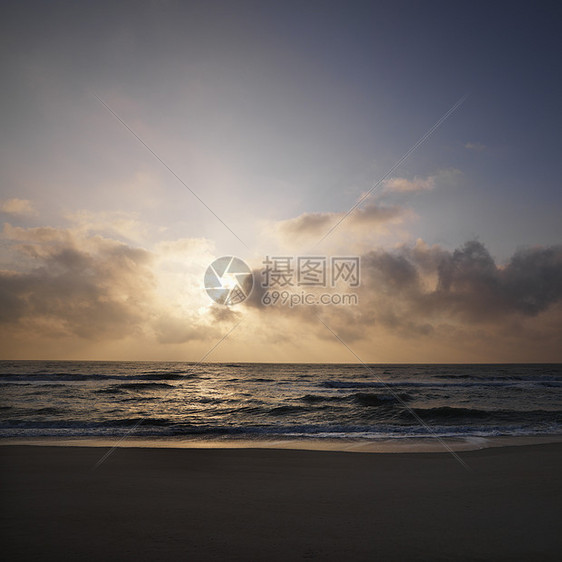 日落在海滩上正方形照片海岸假期海岸线支撑目的地海洋自然界旅行图片