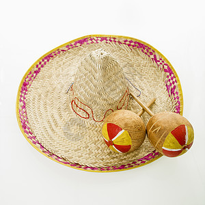 索布雷罗和马拉卡斯文化手工嘉年华边帽伦巴舞者拨浪鼓摇铃乐器派对静物图片