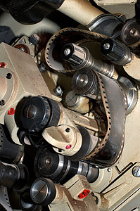旧电影放映机投影仪技术投影生产单元展示卷轴古董灰尘动画片图片