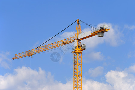 黄色建筑建筑起重车职场工作蓝色天空商业起重机工程财产金属背景